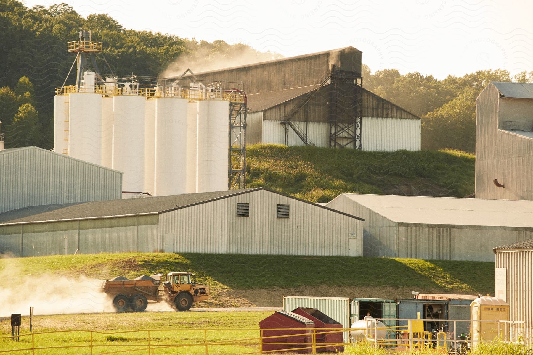 Agricultural facility with truck transporting products