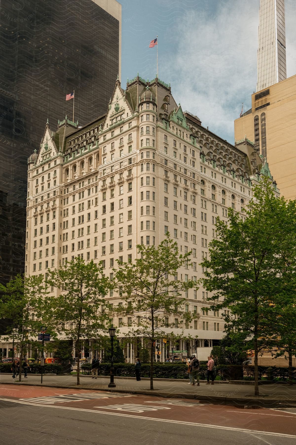 A large ornate building in the middle of the city