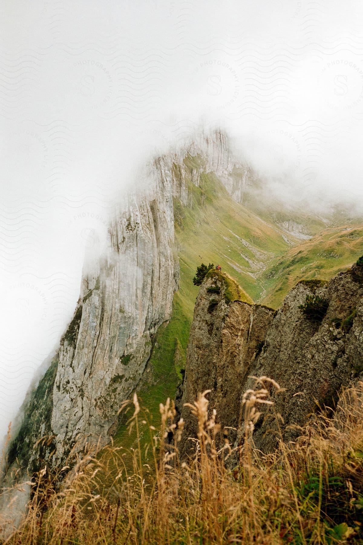 Mountain range with vegetation and cloudy sky