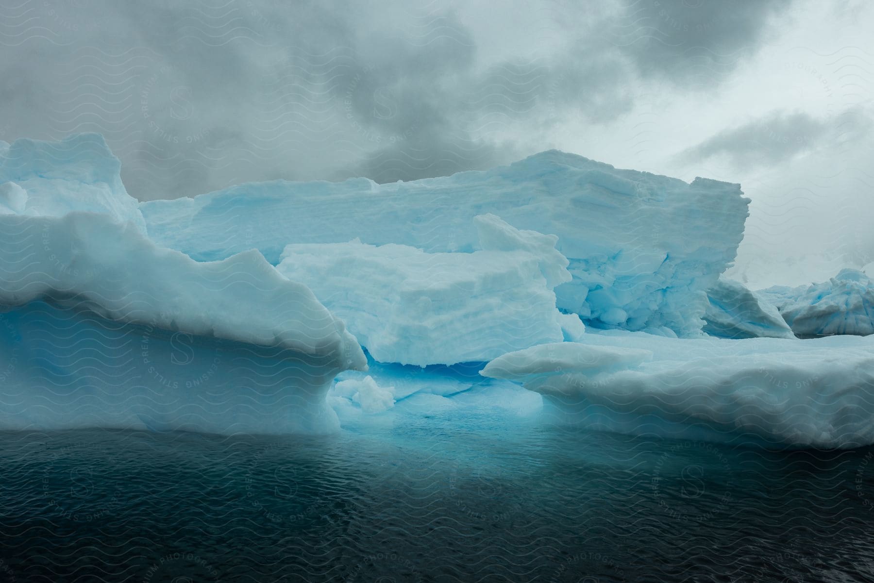 A snowy tunnel with water streaming through in the arctic