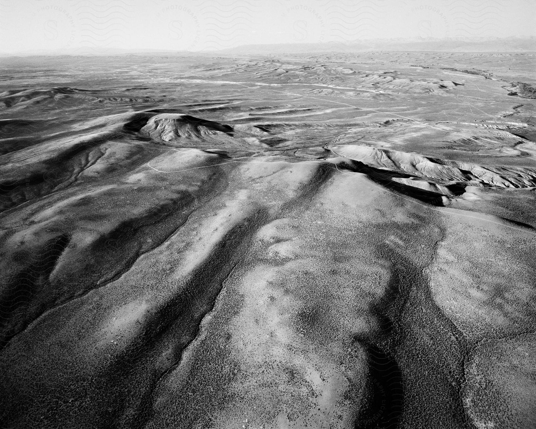 Cracks form along dry soil in the desert