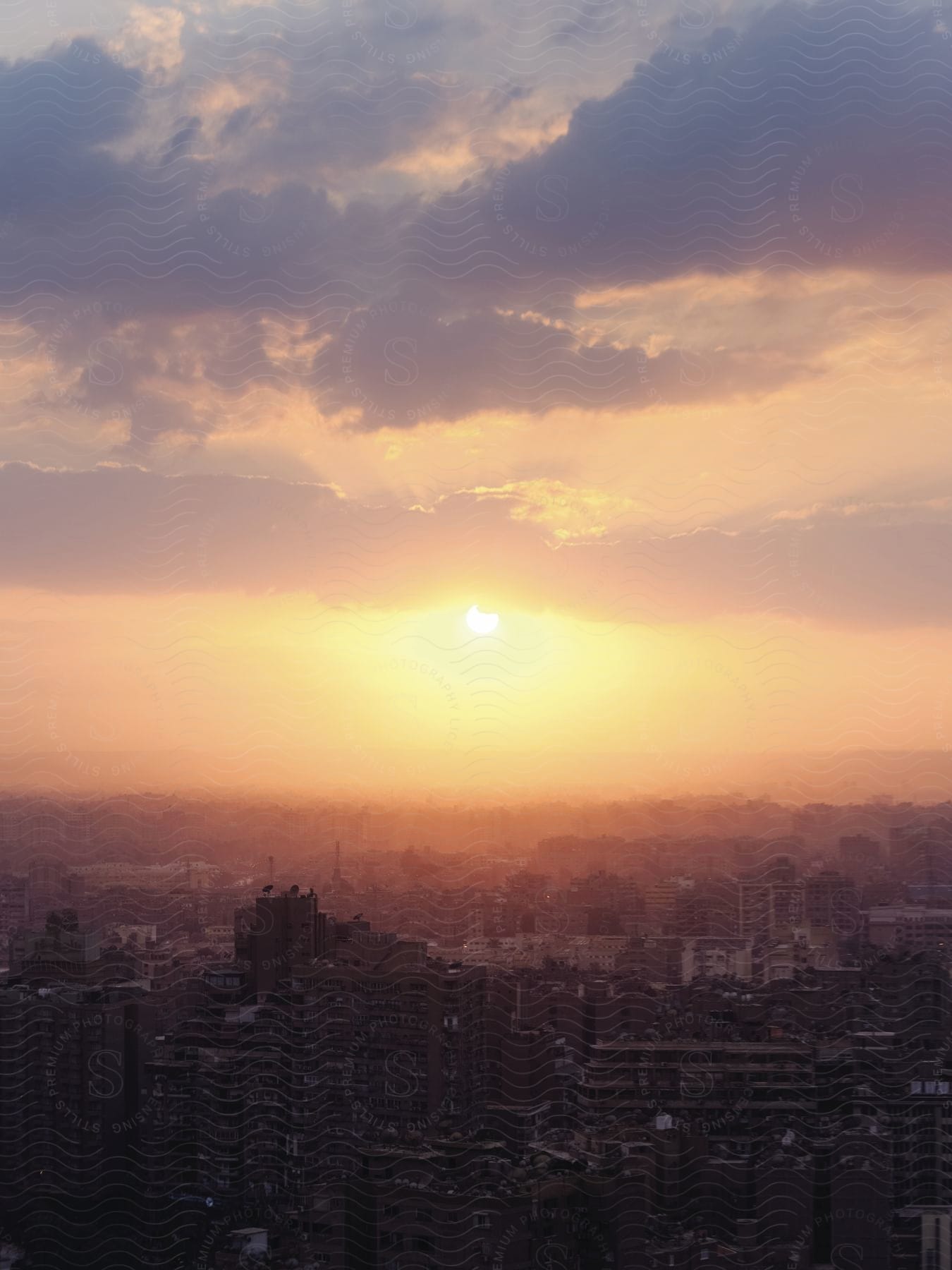 An urban city with bustling streets and towering skyscrapers is bathed in the radiant glow of the sun