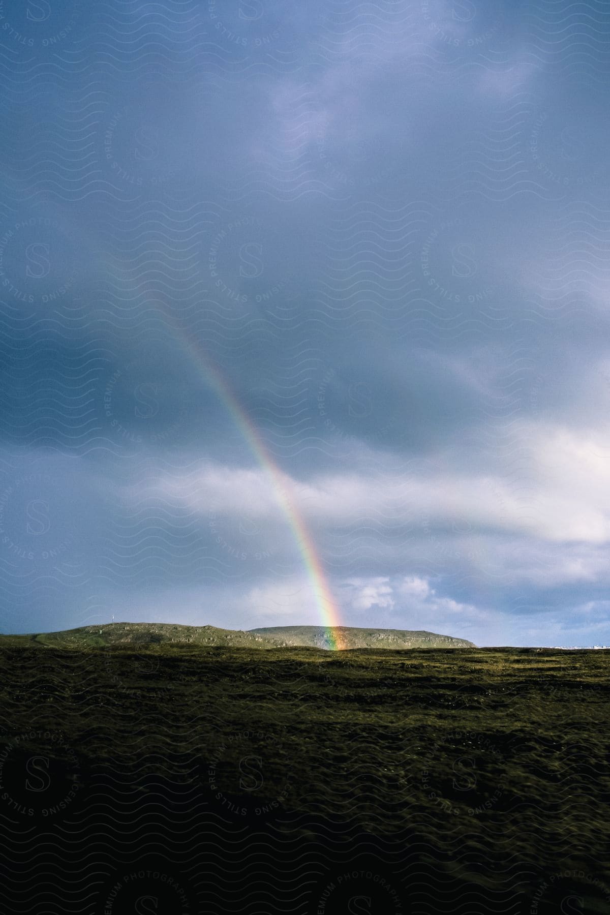 A rainbow over grasslands