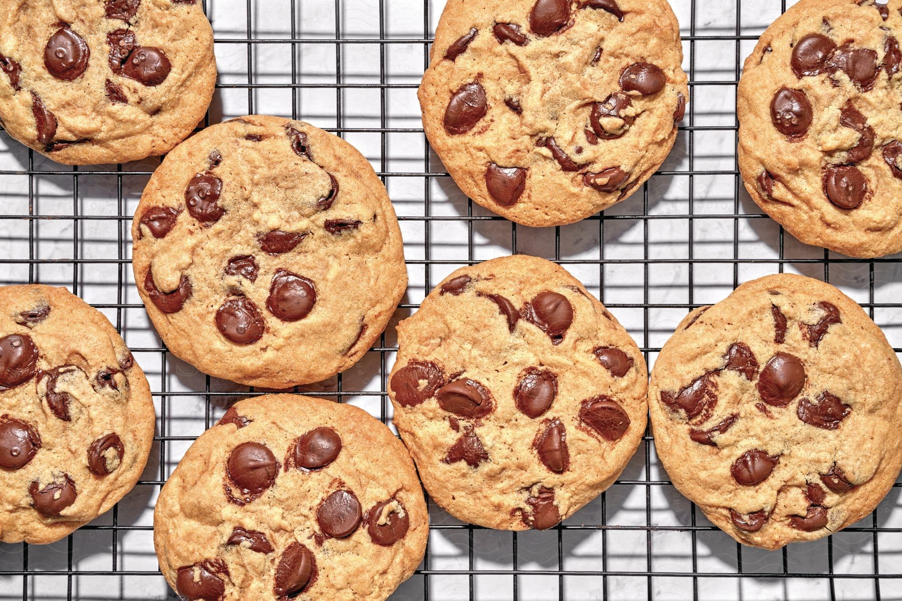 Chocolate drop cookies cooling on a rack