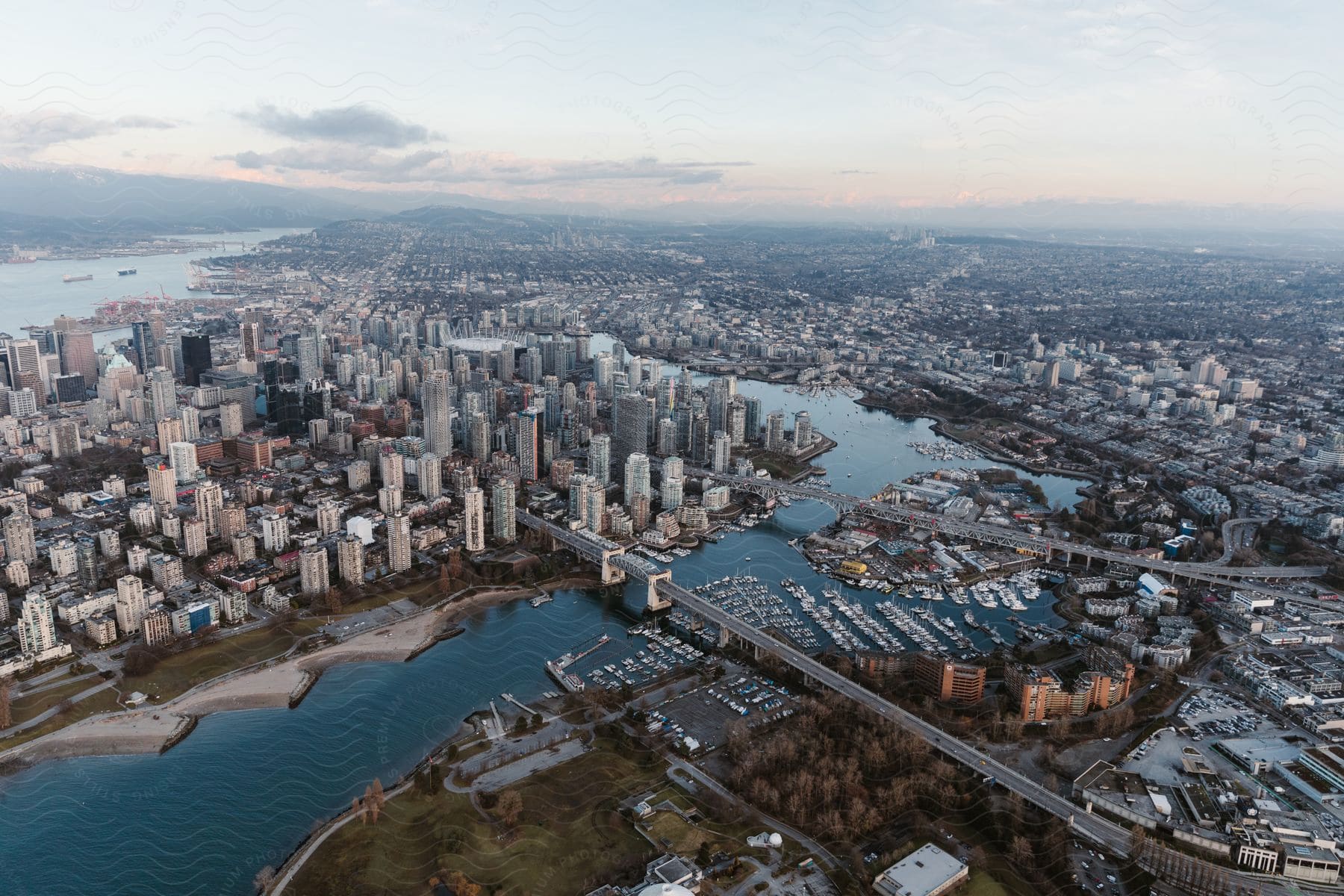 Aerial view of a city with a bridge over water