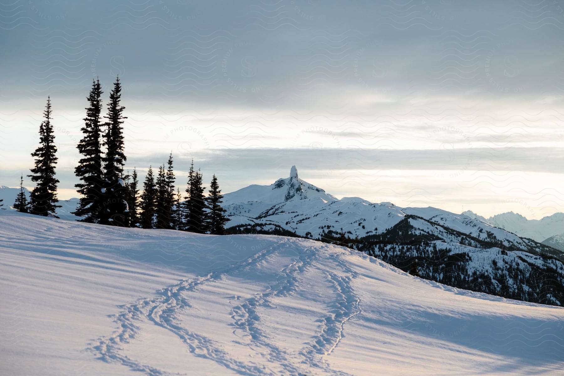 Sun shining on mountain tops in british columbia