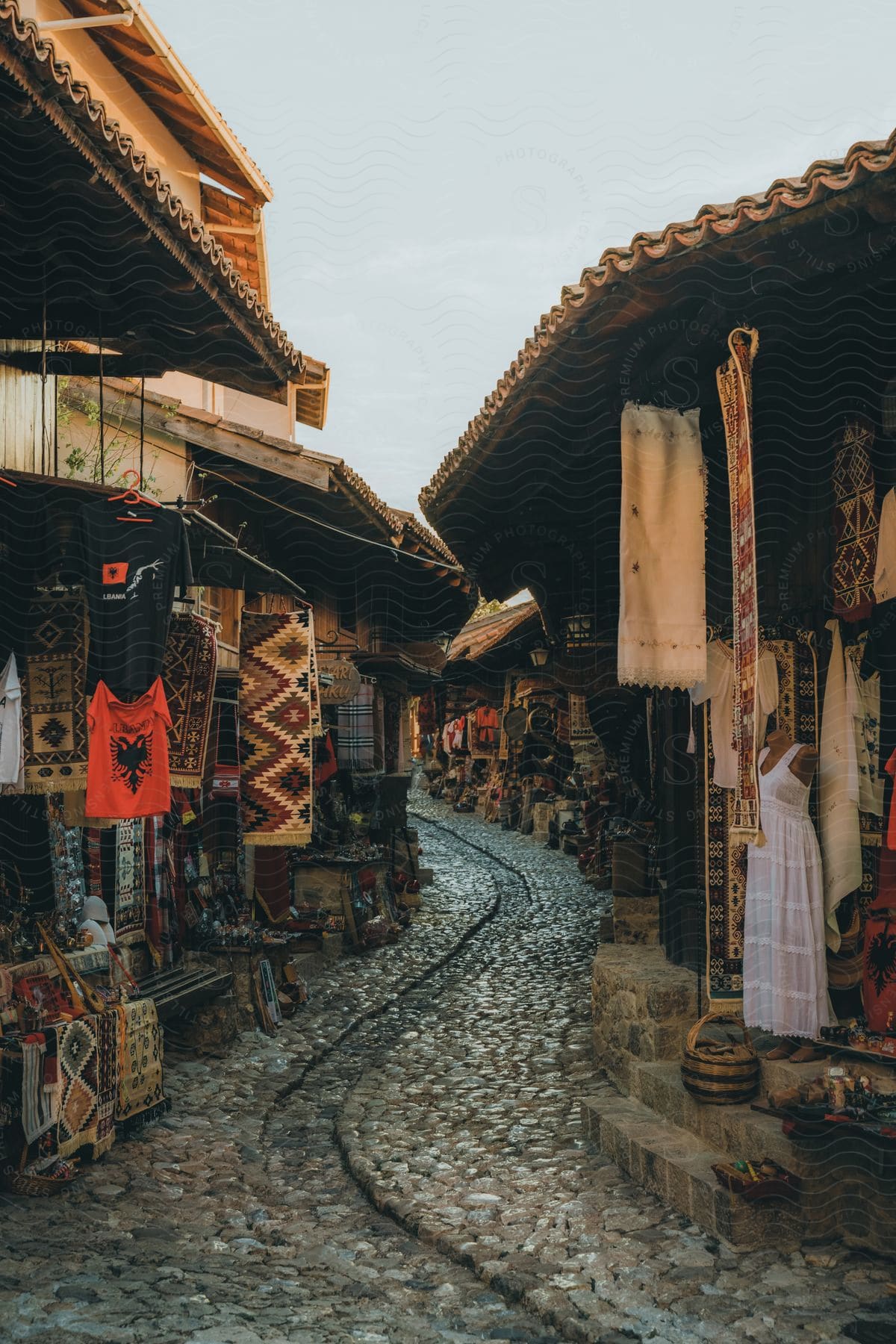 A cobblestone street in a city market