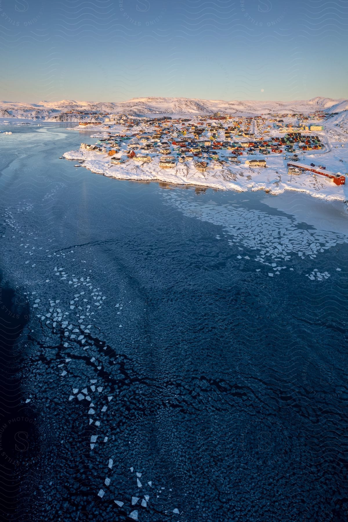 A village in a remote icy location seen from above