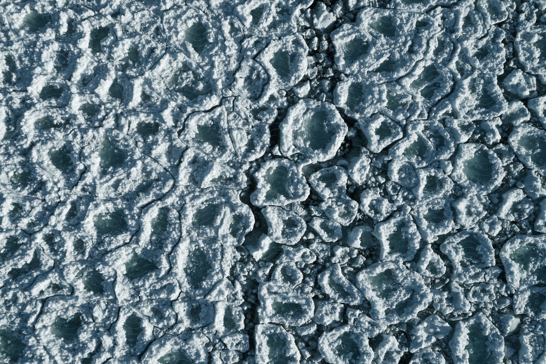 Aerial shot of a rocky terrain in a grey color palette