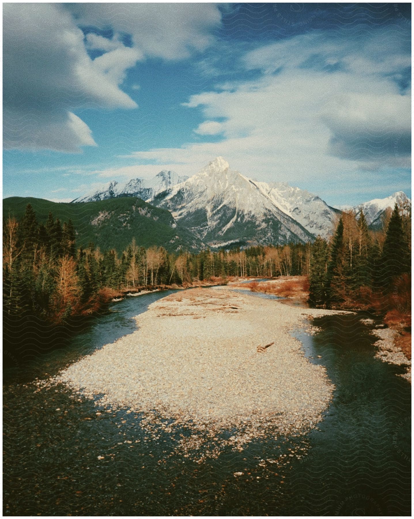 Aerial perspective of a lake near a mountain range