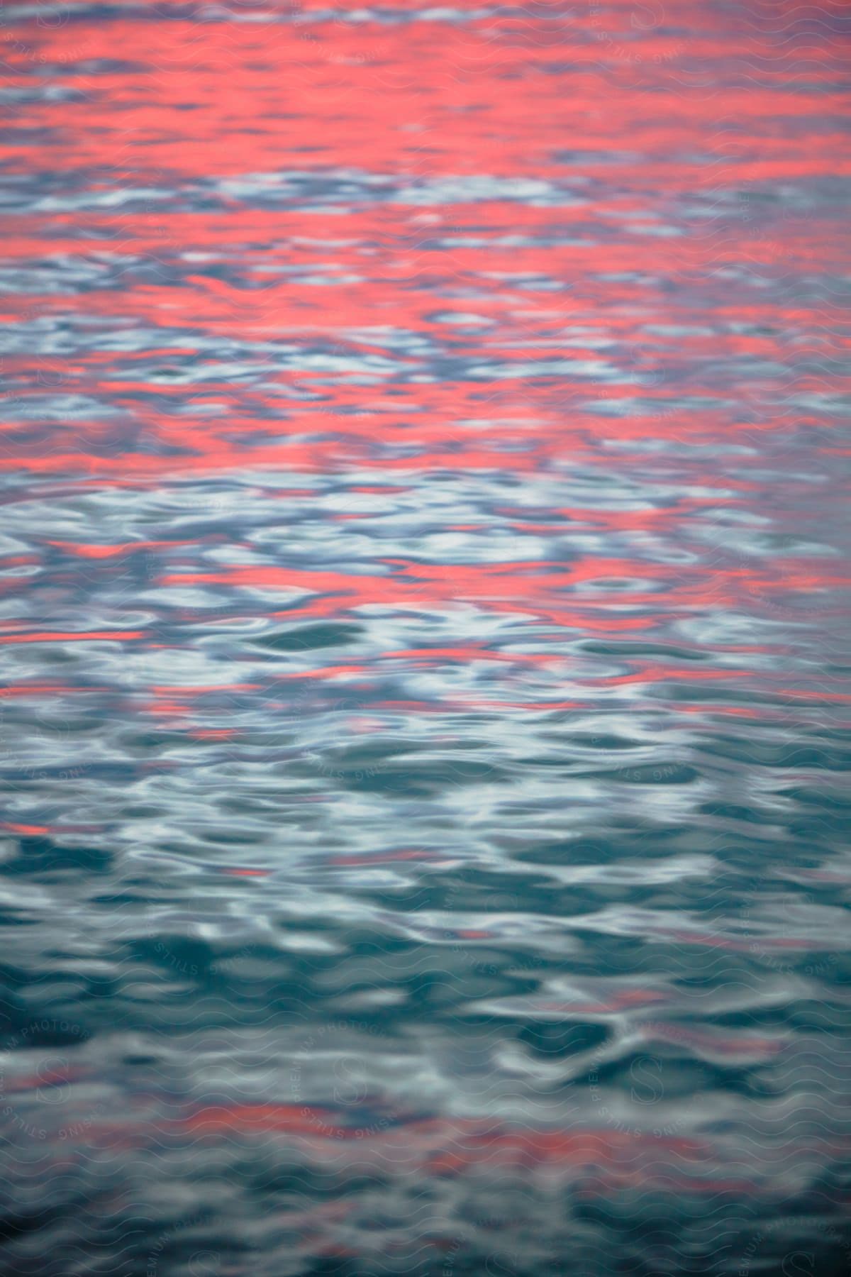 Sunlight reflected on water with ripples