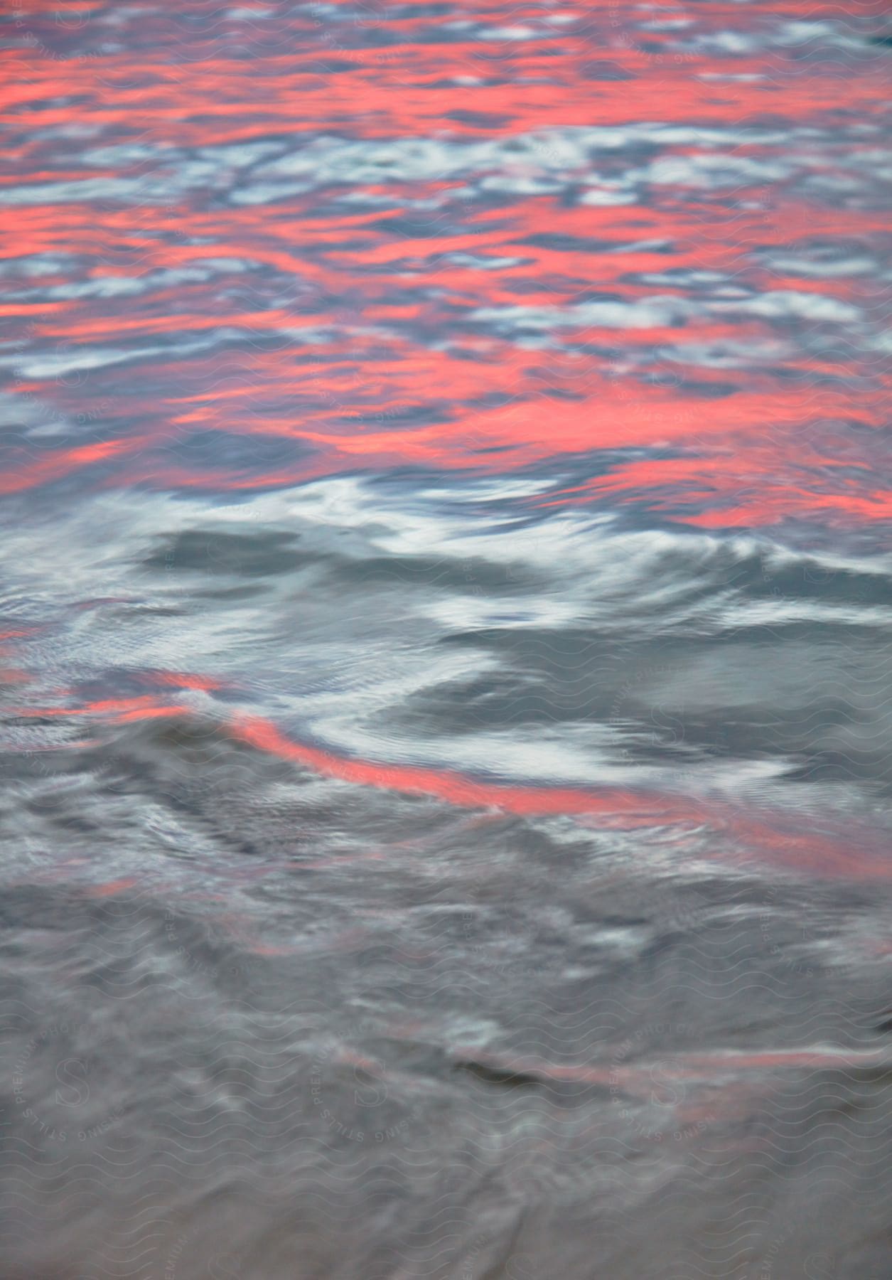 The Evening Sun Reflects On The Water