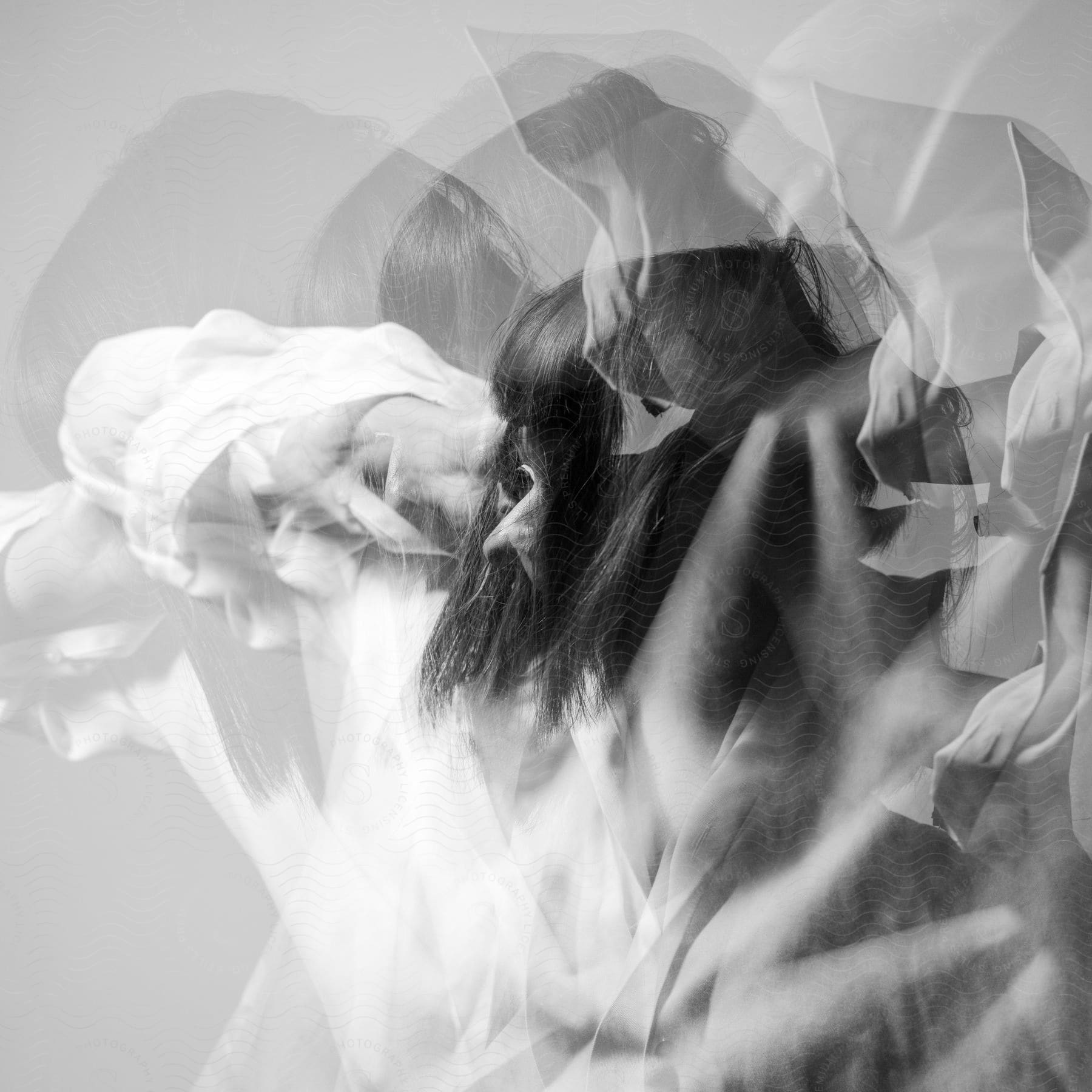 A woman captured in multiple exposures