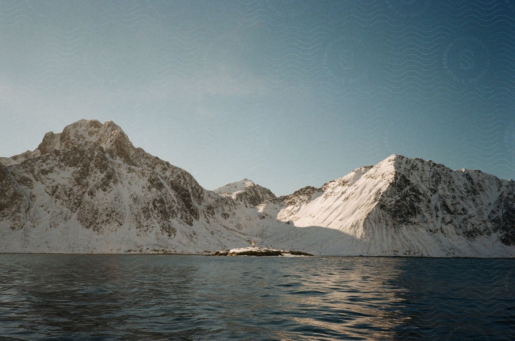 Snowy mountains on the coast during winter