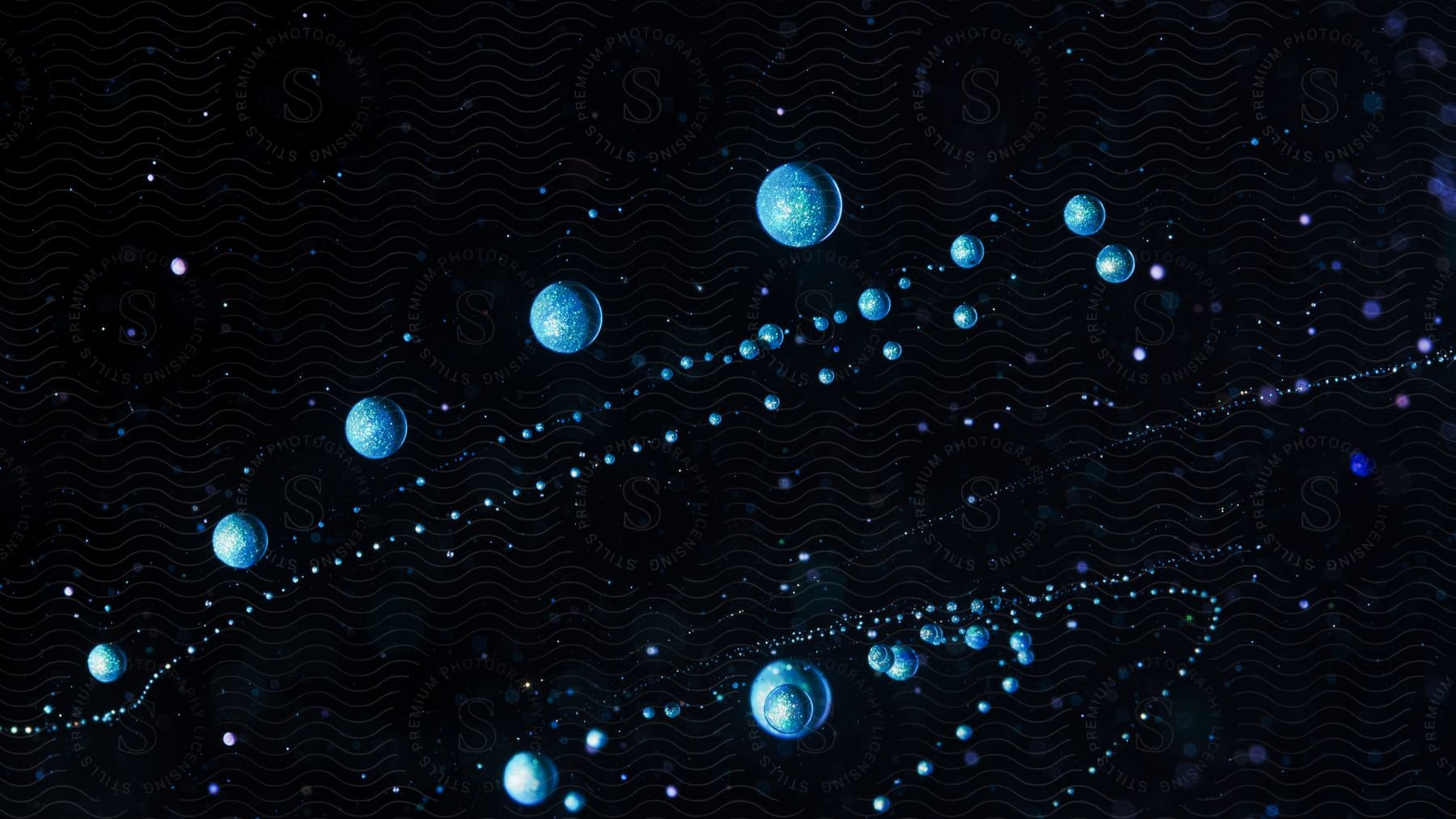 Abstract blue spheres on a black background