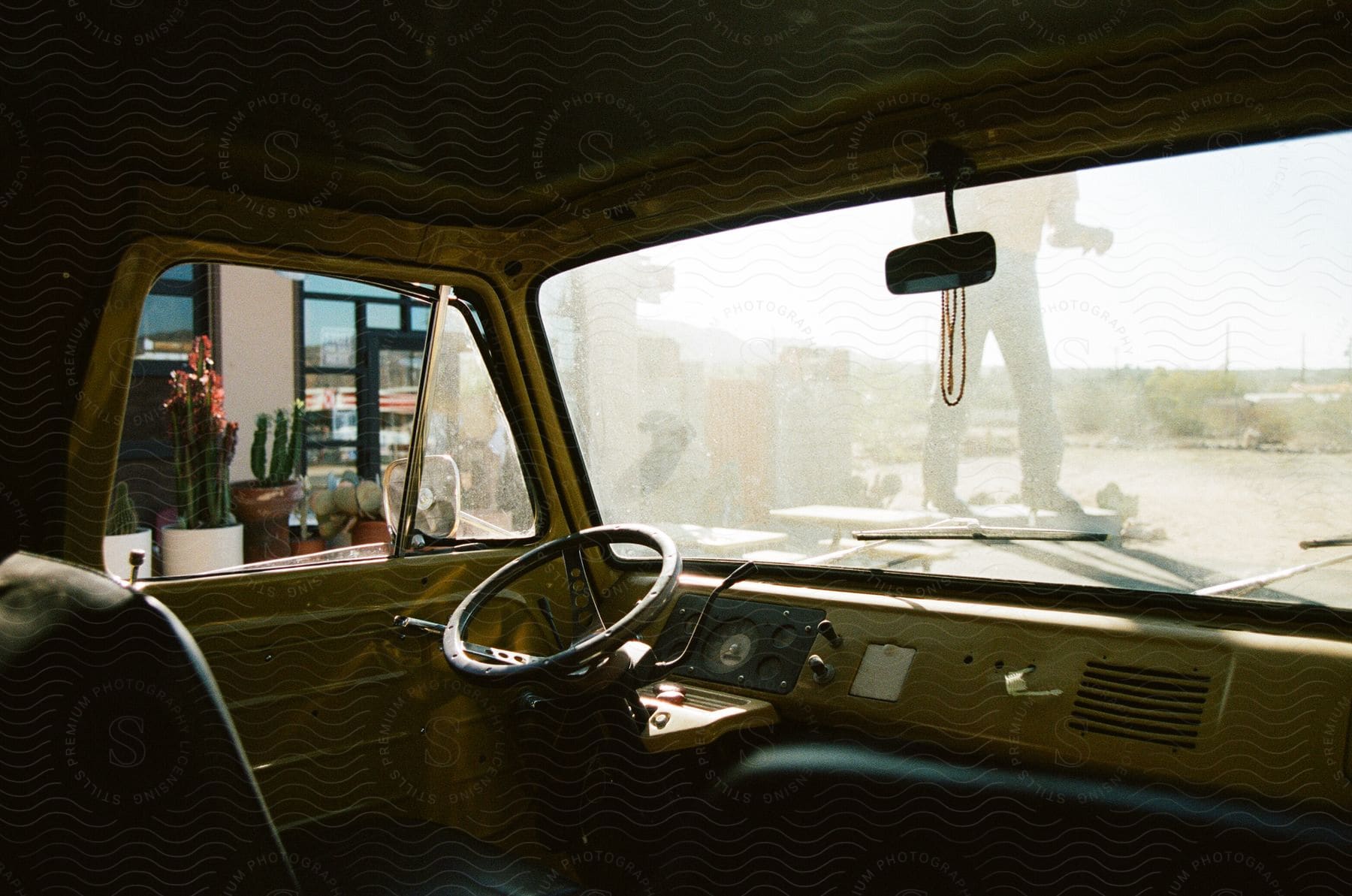 A van parked at a bus stop