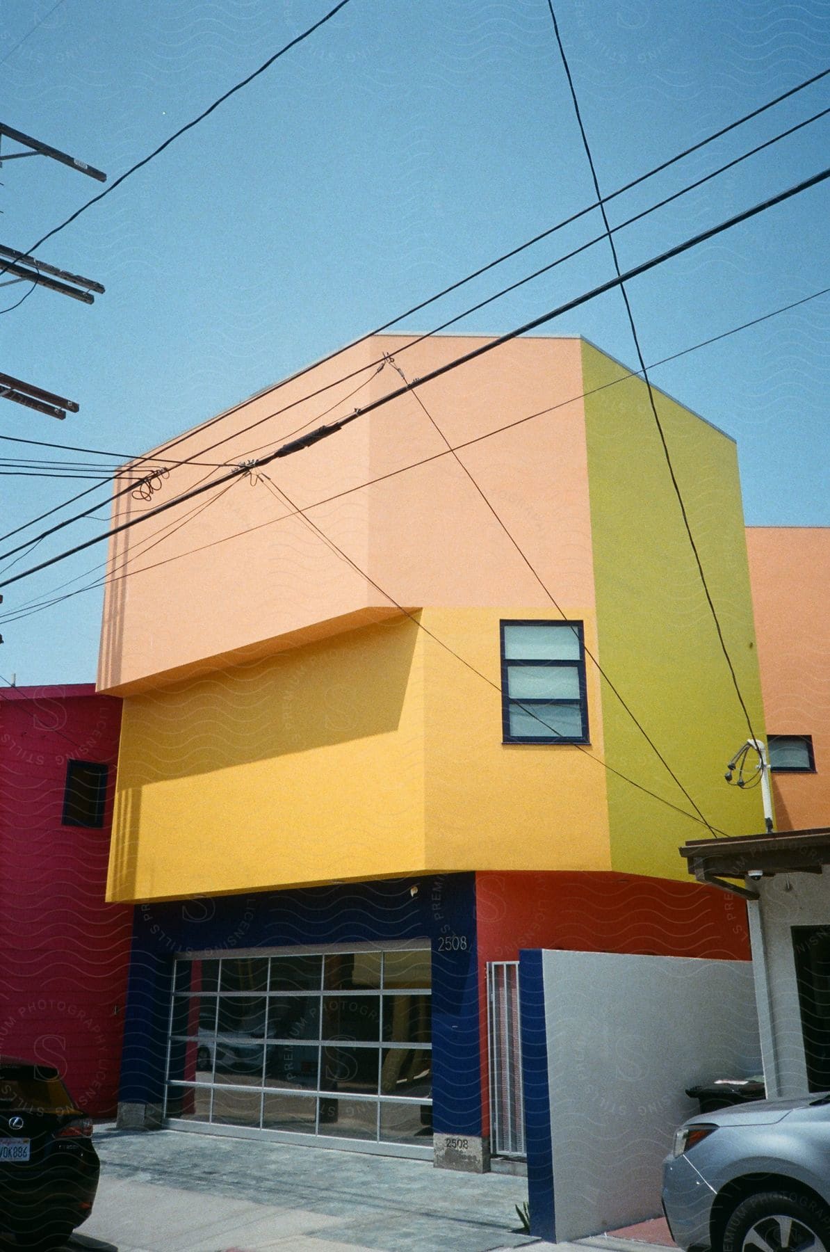 Stock photo of a multicolored house in a suburban neighborhood