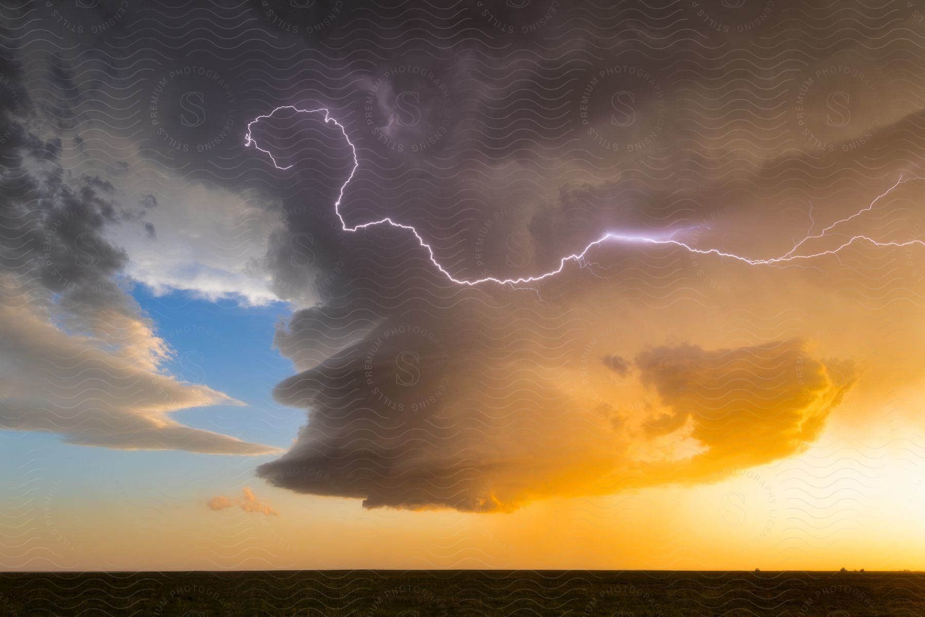 A low precipitation supercell spins southwest of dalhart texas at sunset