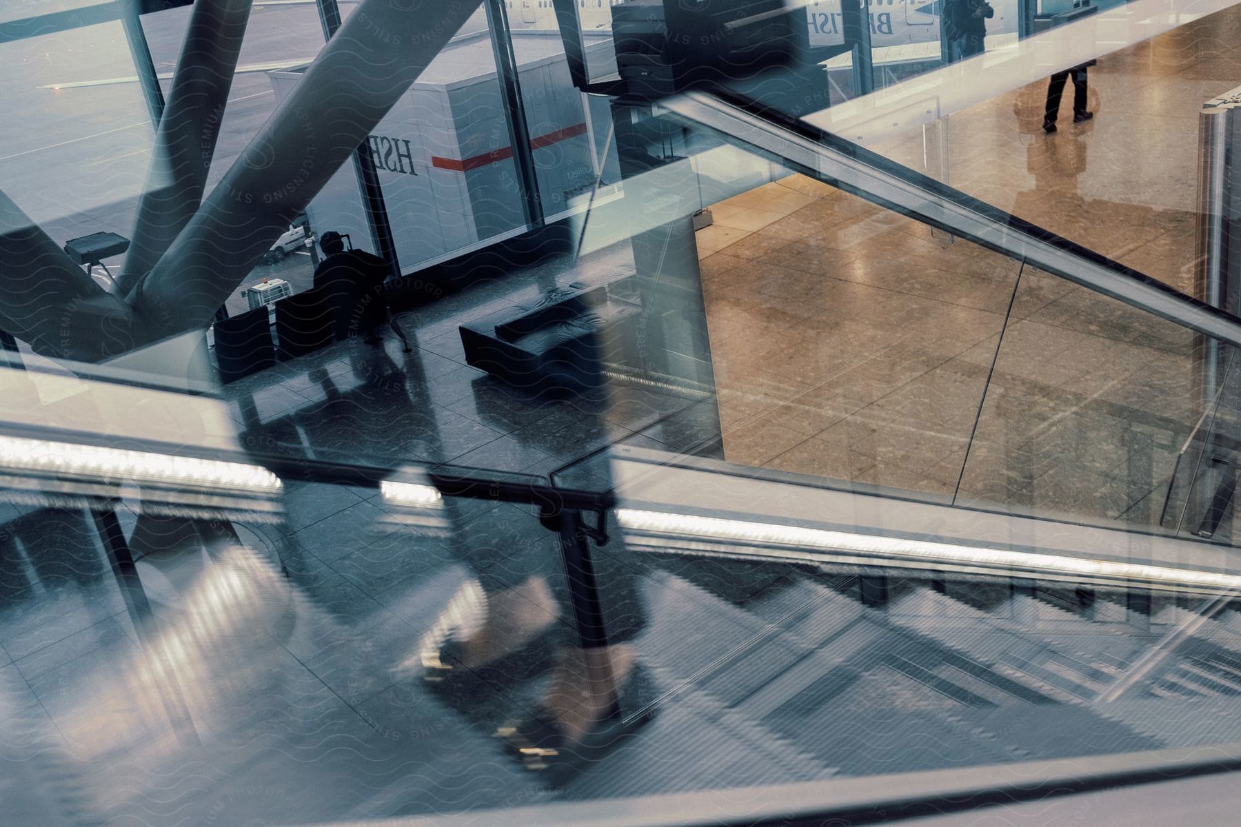 Empty airport terminal with bright daylight streaming through the windows