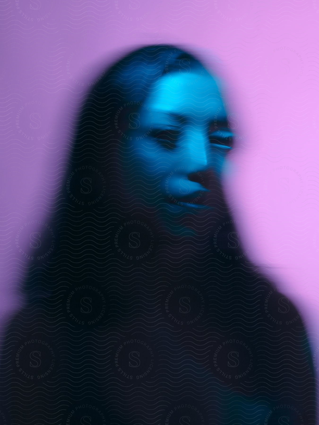 A woman with empty eyes in a blurred image