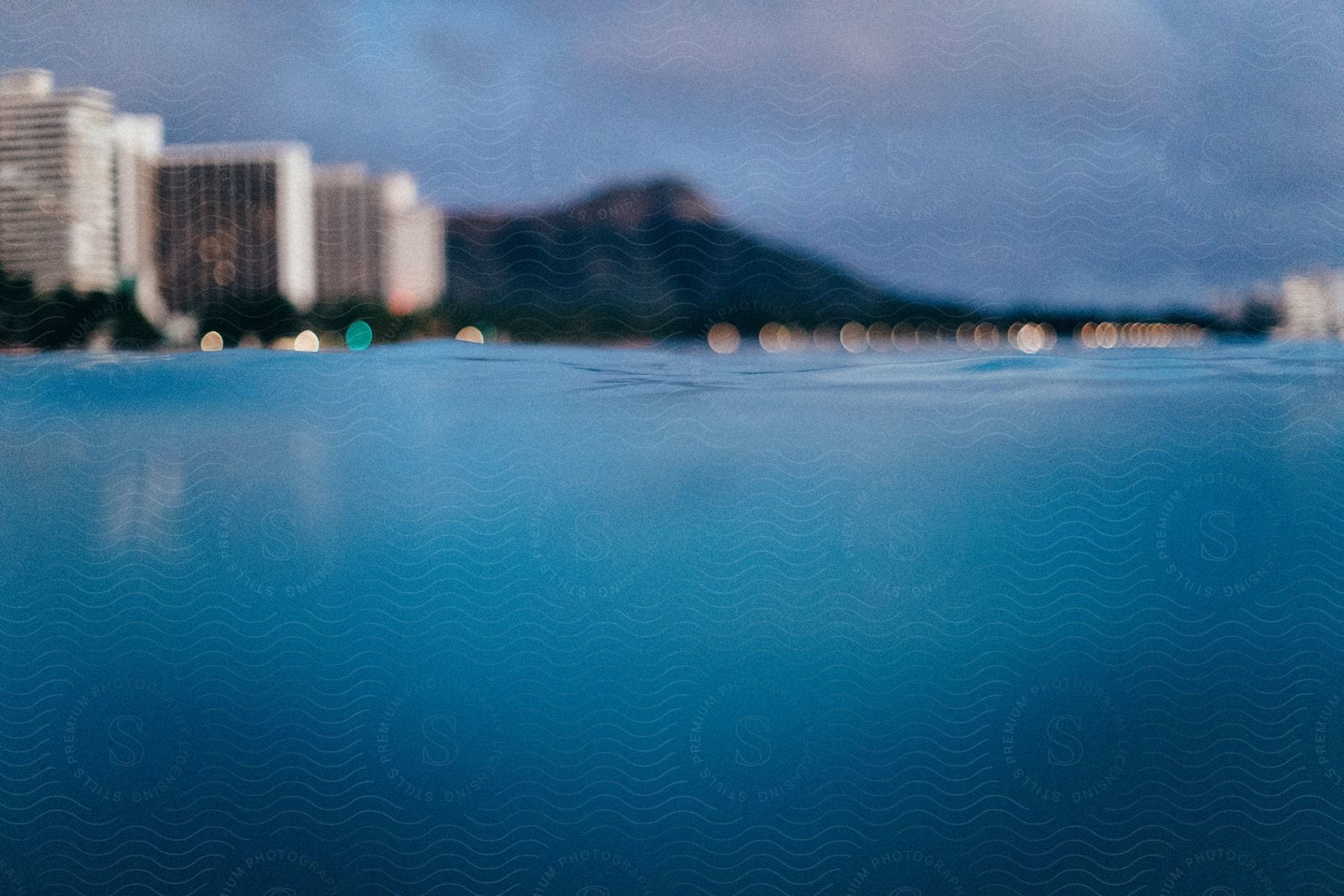 Buildings next to the ocean taken from the ocean