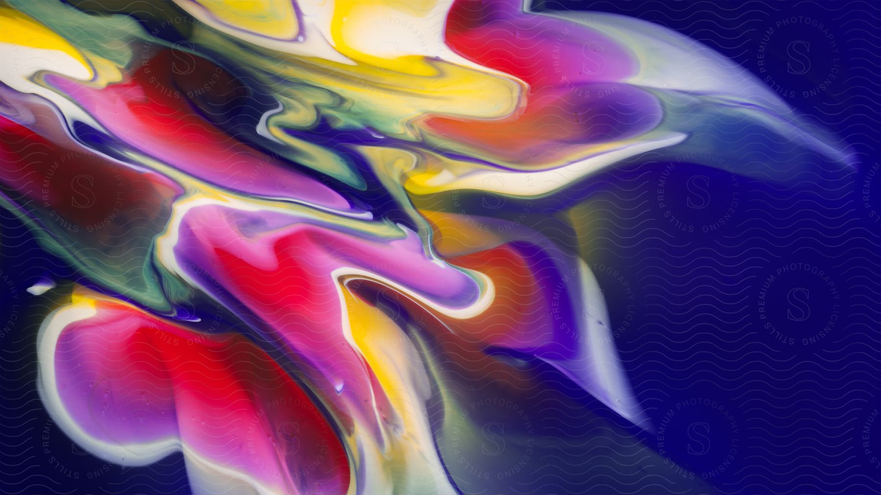 Stock photo of liquid and colorful abstract painting.