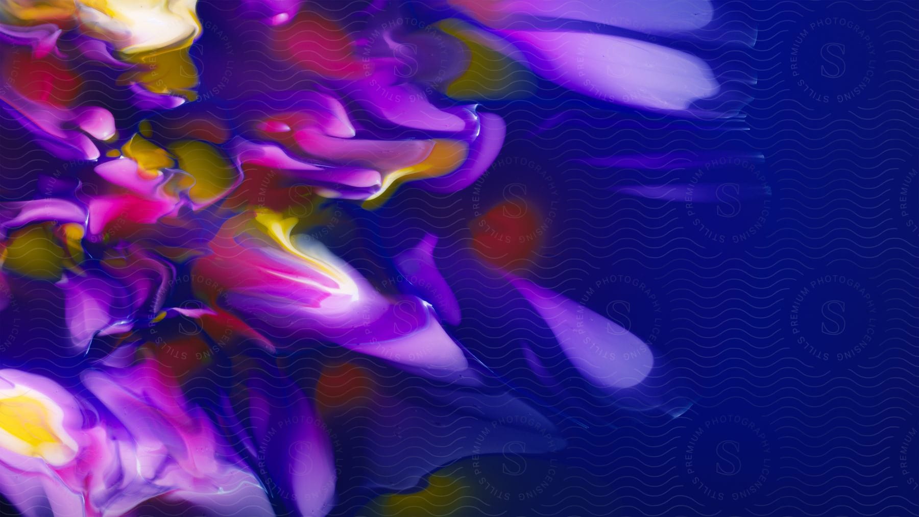 Abstract digital art of a cascading waterfall of colors mixing and blending together.