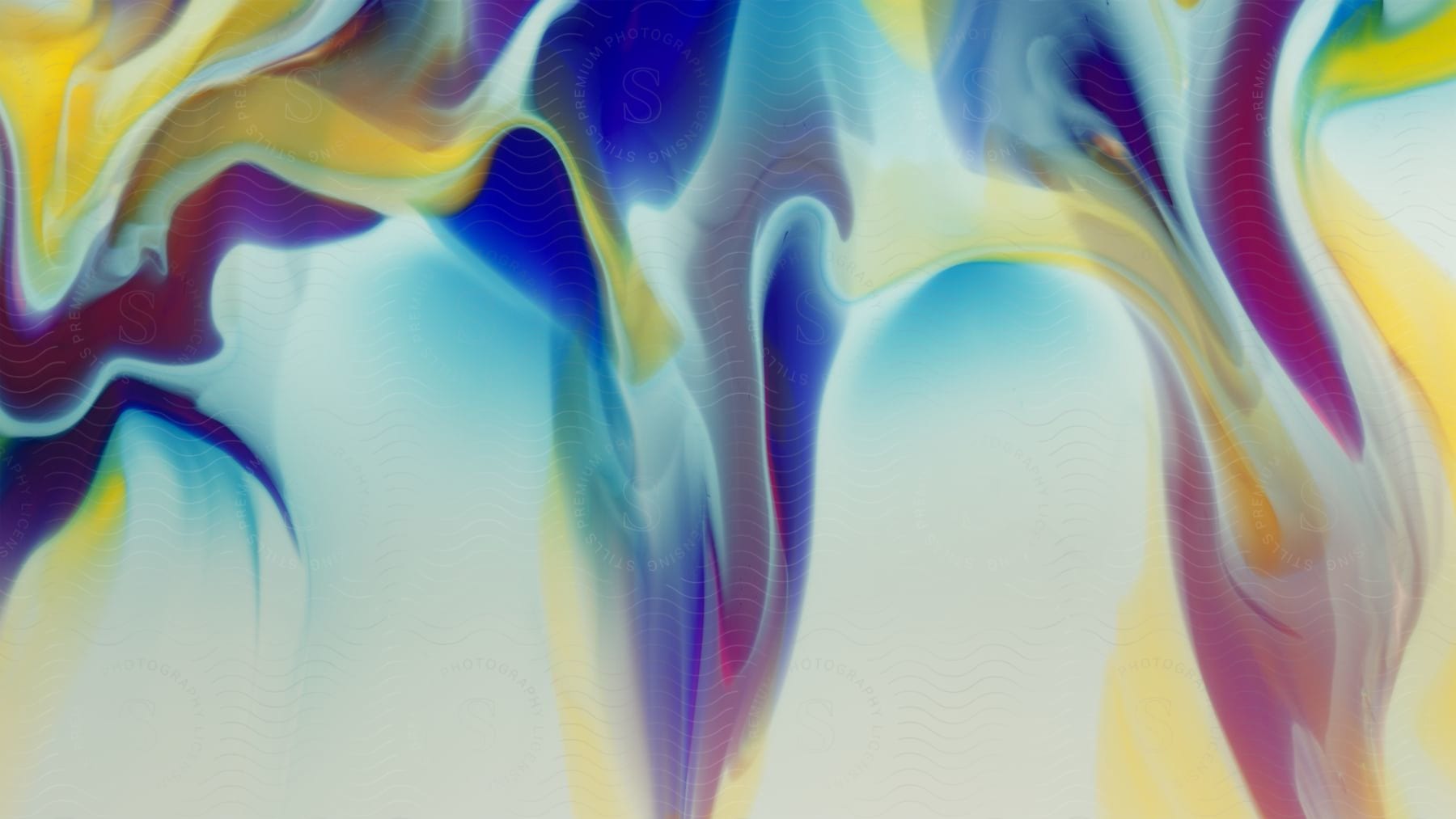 A bright colorful abstract of white blue red and yellow