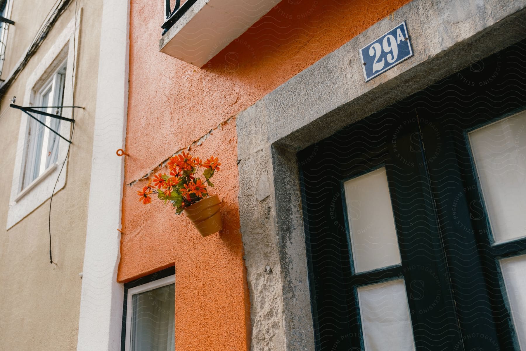 A building with a door and numbers above it