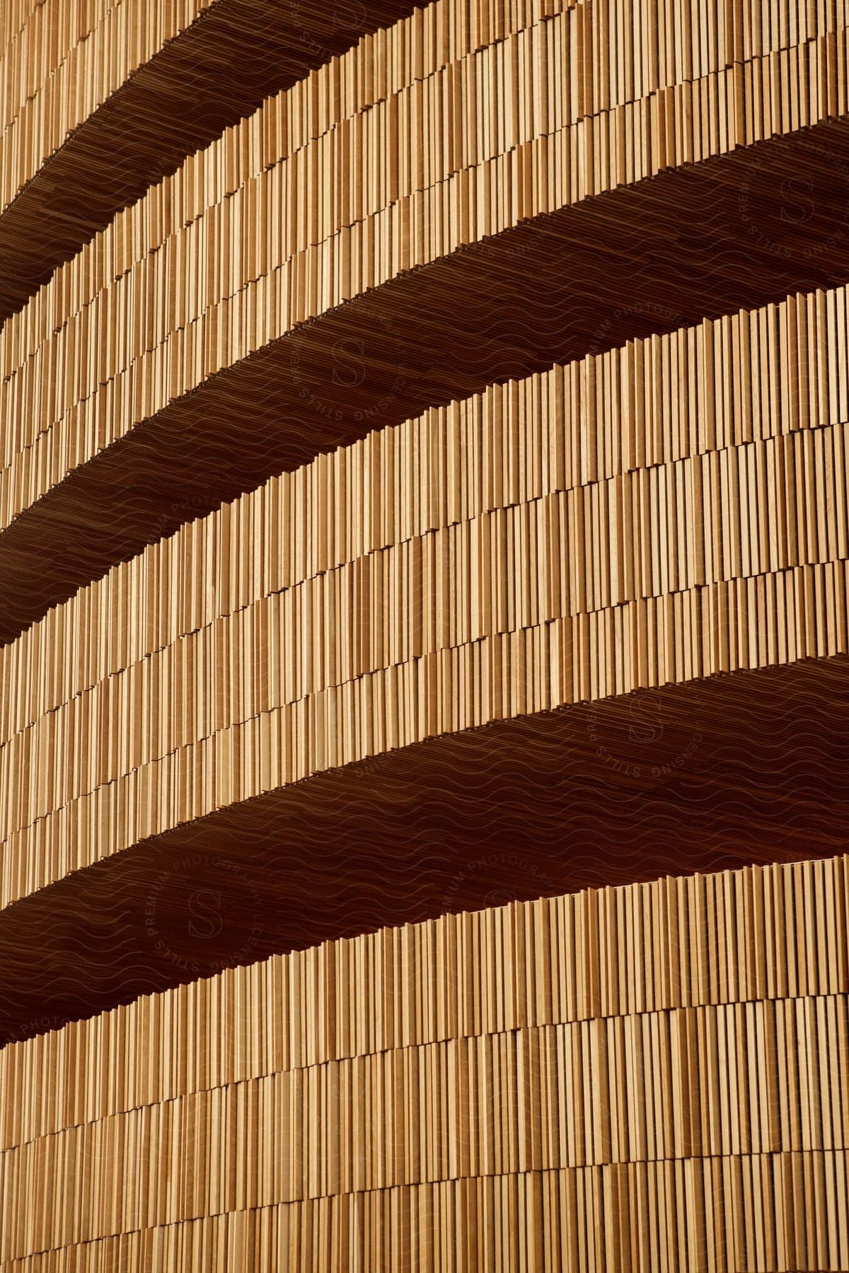 Wooden wall architecture of the Oslo Opera House where objects are arranged in a circular fashion.