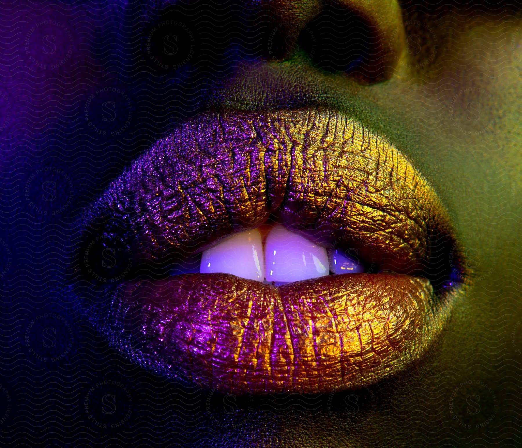 Extreme close-up of a person's lips with lipstick.