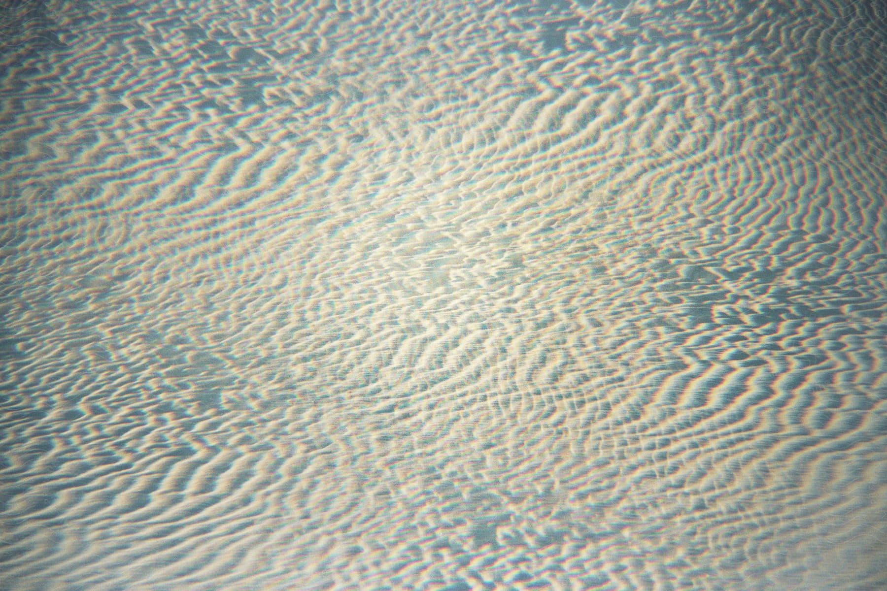 sand on a beach during the day time in summer