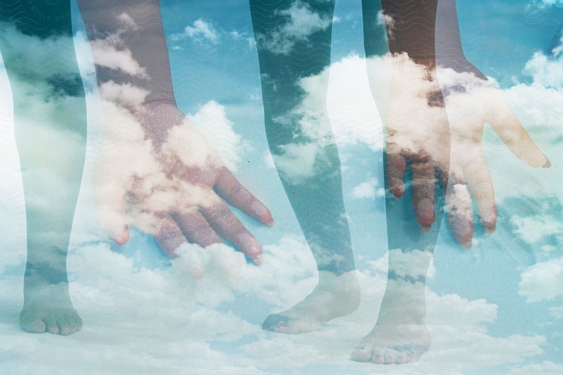 Two people's hands and feet, seen through a cloud.