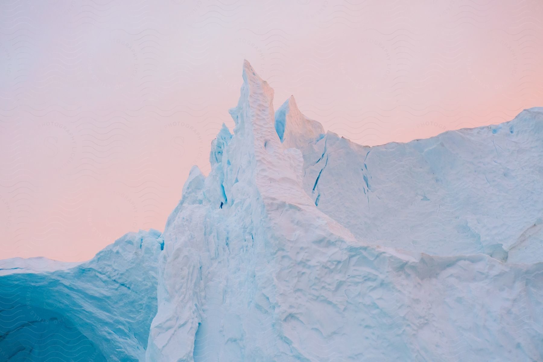 An ice cap in the light of a sunrise.