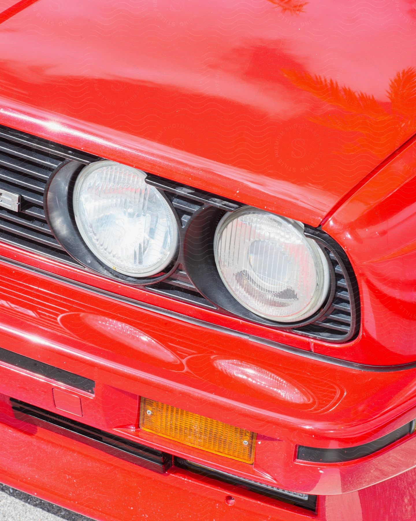 The left side headlights of a car.