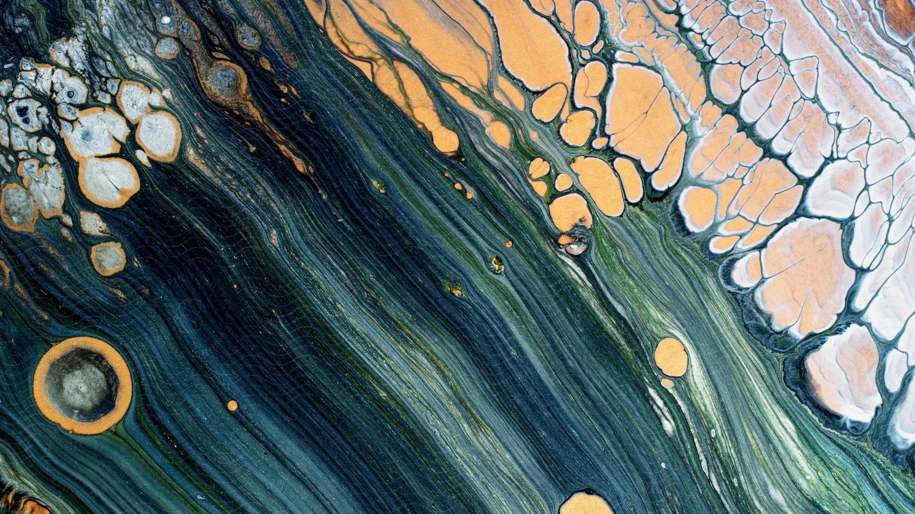 abstract oil painting of green and yellow liquid with bubbles and circles on a yellow background