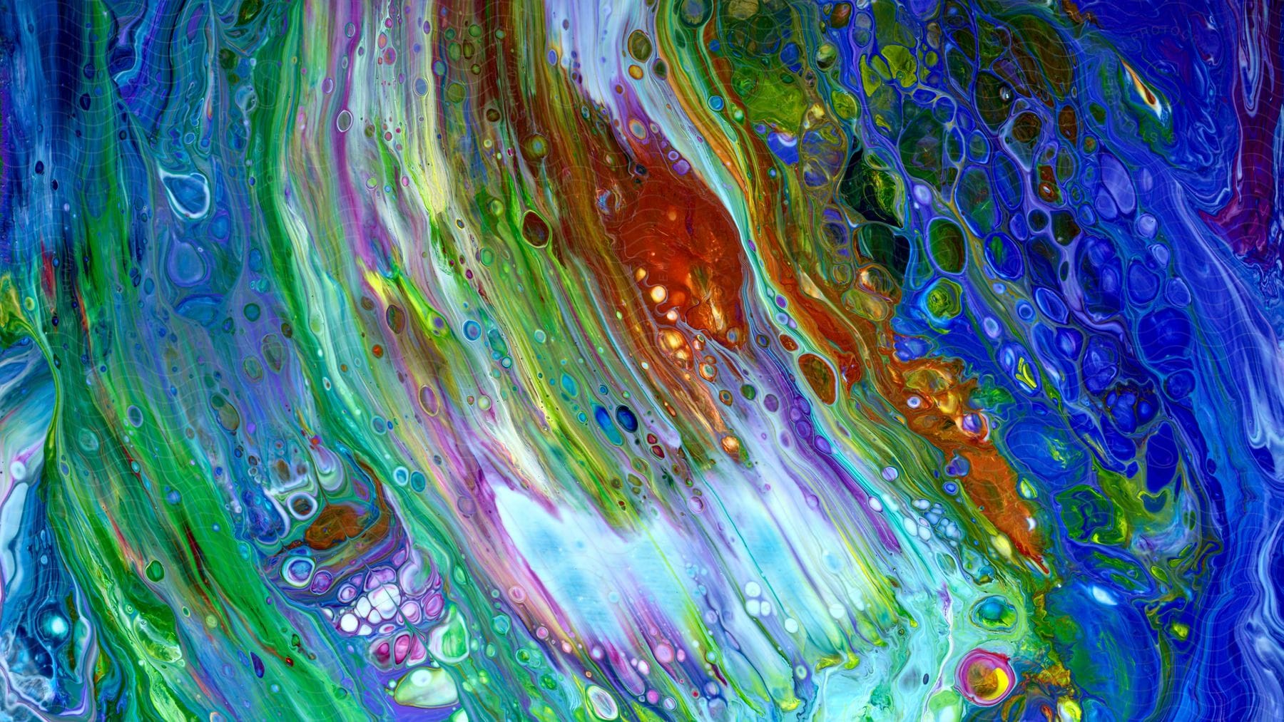 An abstract of bright colors in bubbles and brush marks