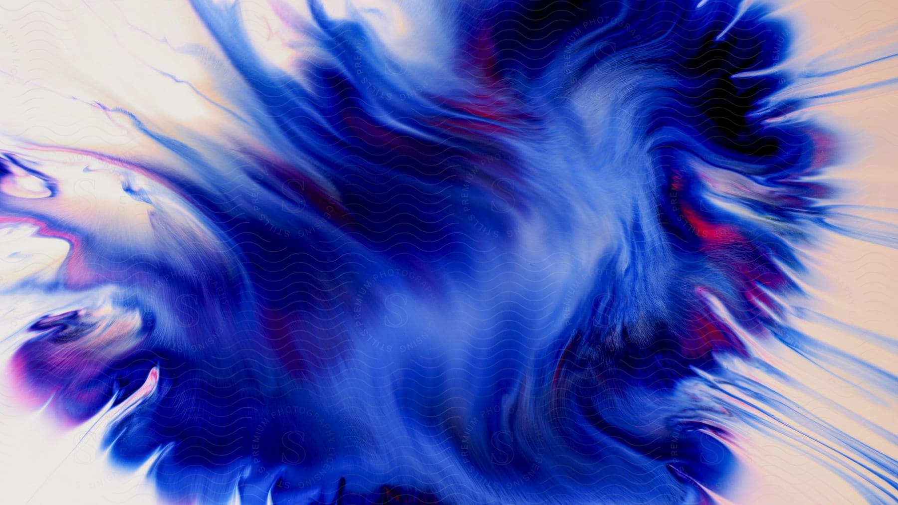 Some fluid with purple, blue, and red liquid in it