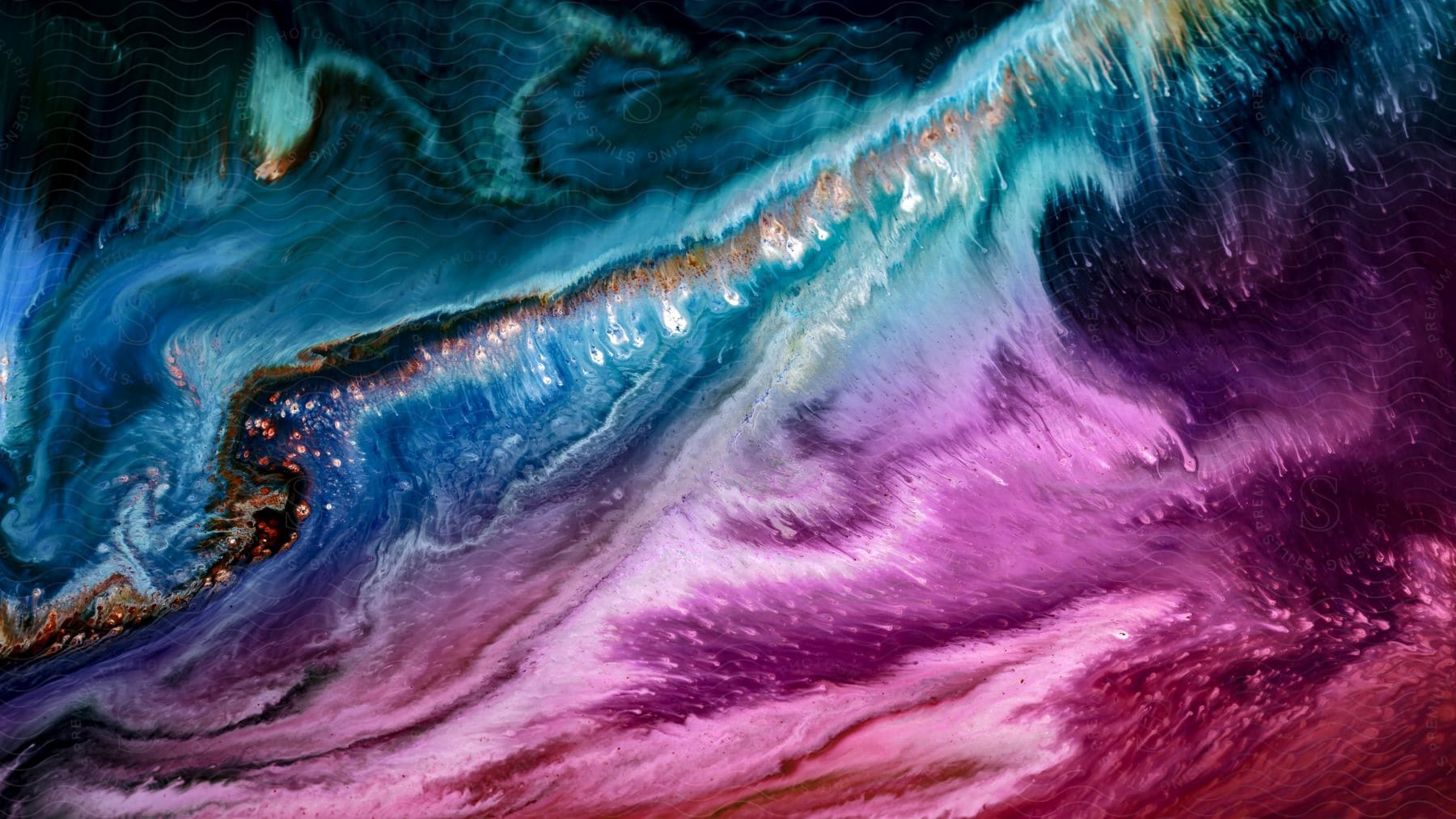 Stock photo of abstract of multicolored waves cresting in water scene.