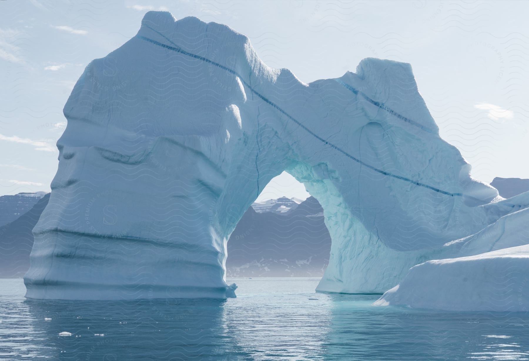 Arctic sea ice with an arched hole in the middle