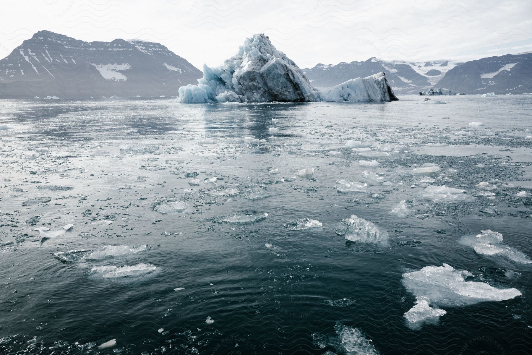 Iceberg glacier floats in water