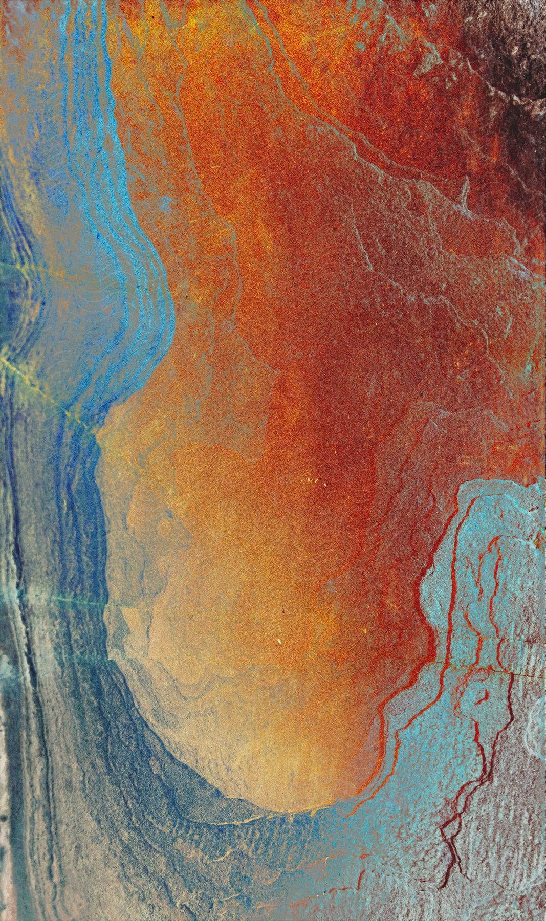 Stock photo of abstract fluid art painting of the world using acrylic paint.