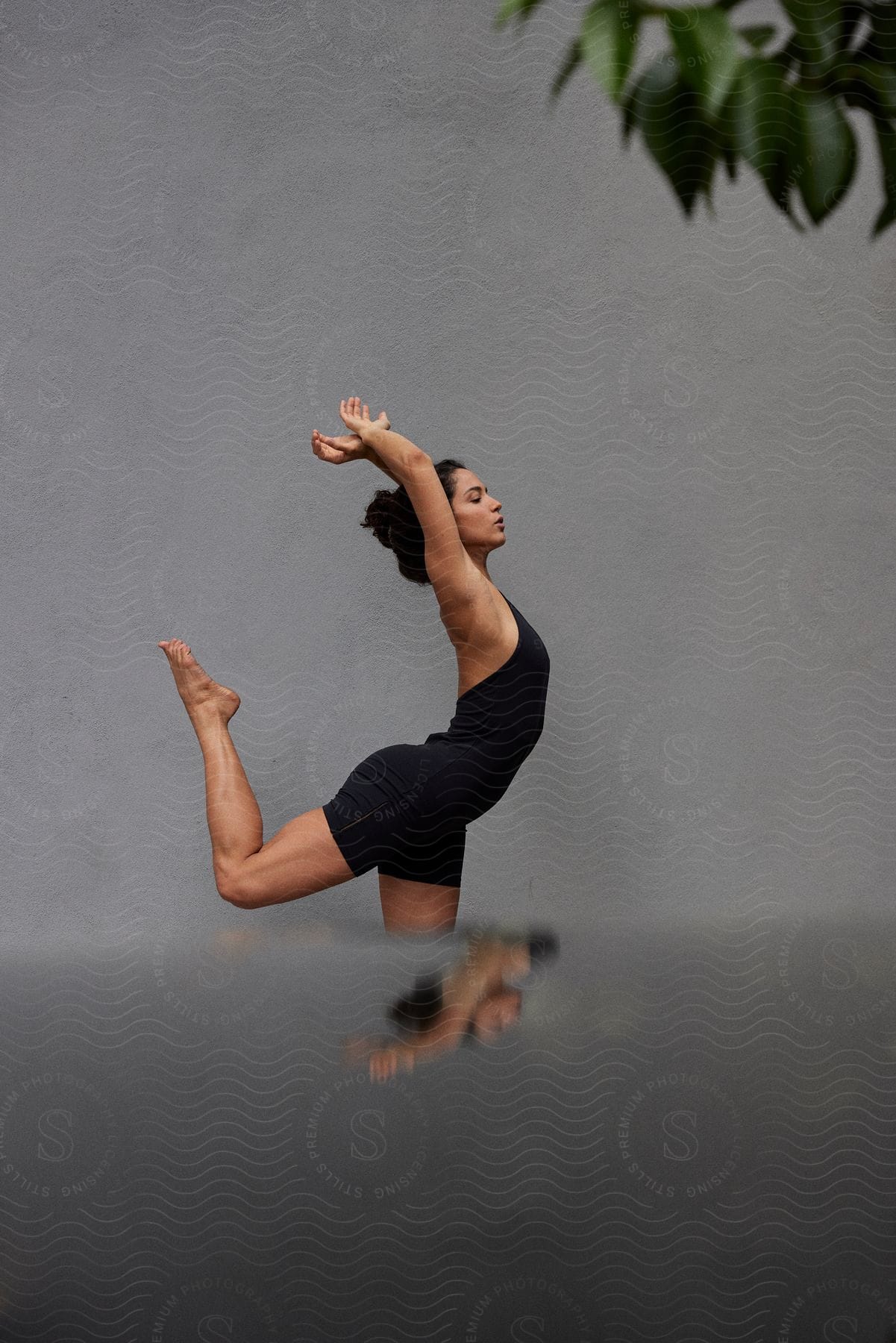 A clip of a lady doing a yoga pose