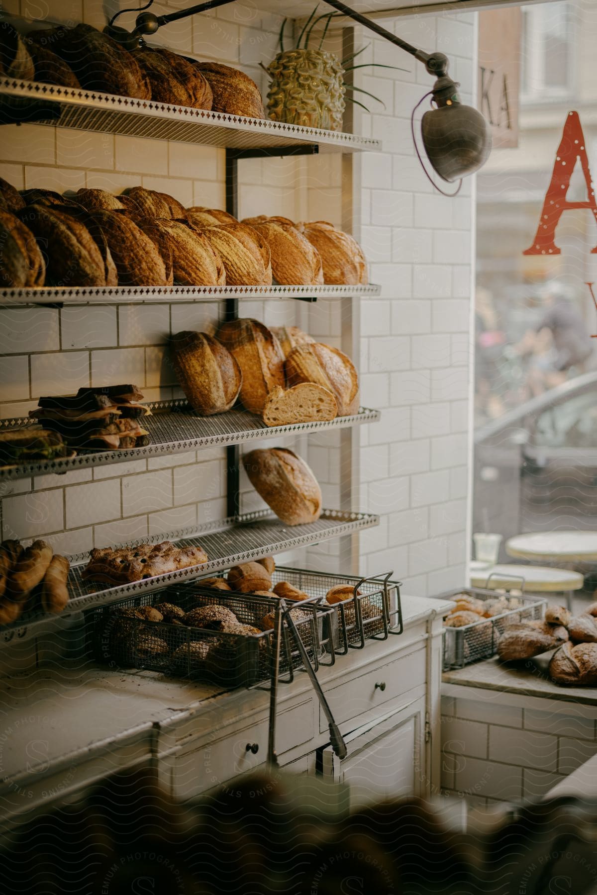 Bread Sits On Wire Racks At A Bakery