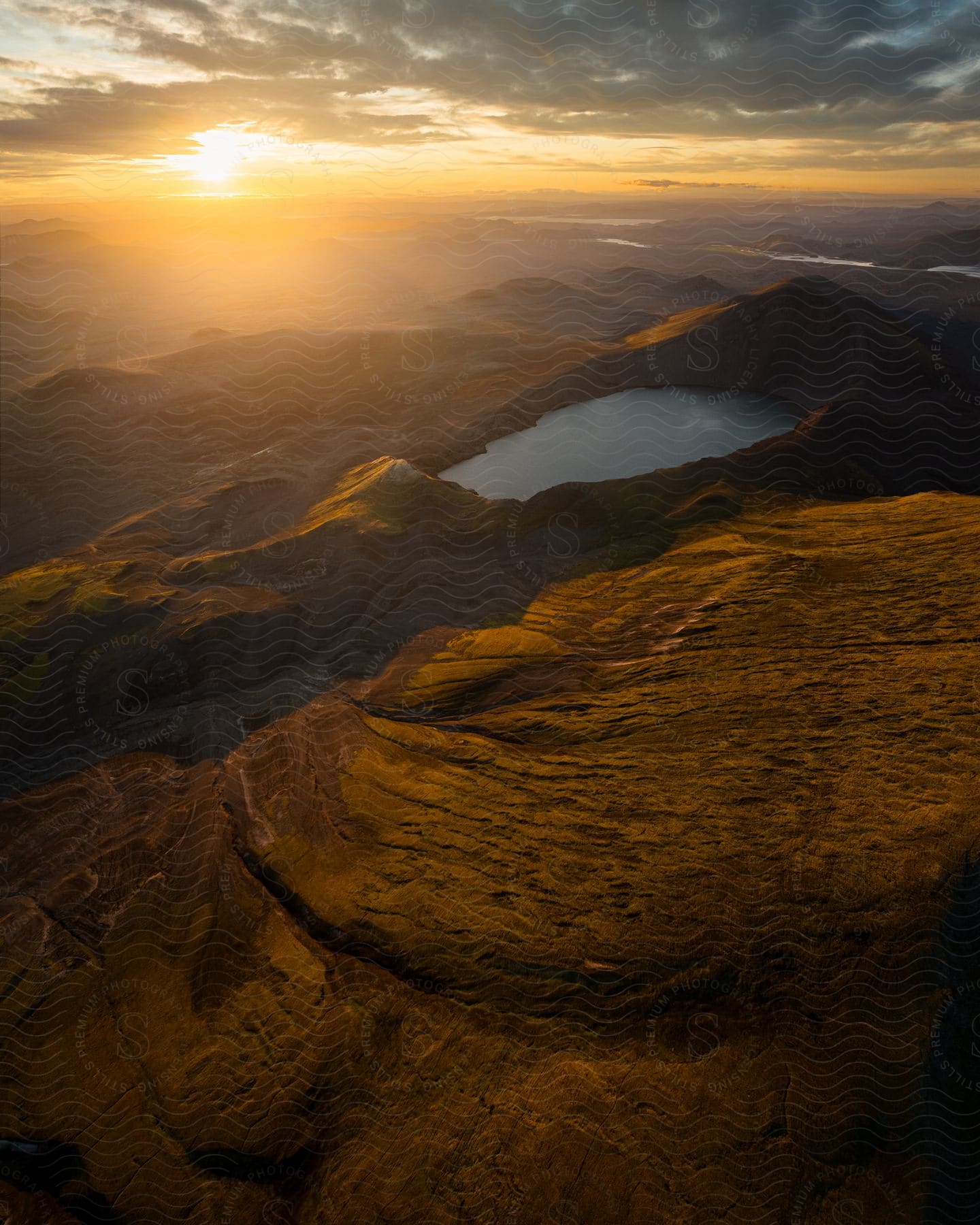 A sun setting over the rocky canyon.