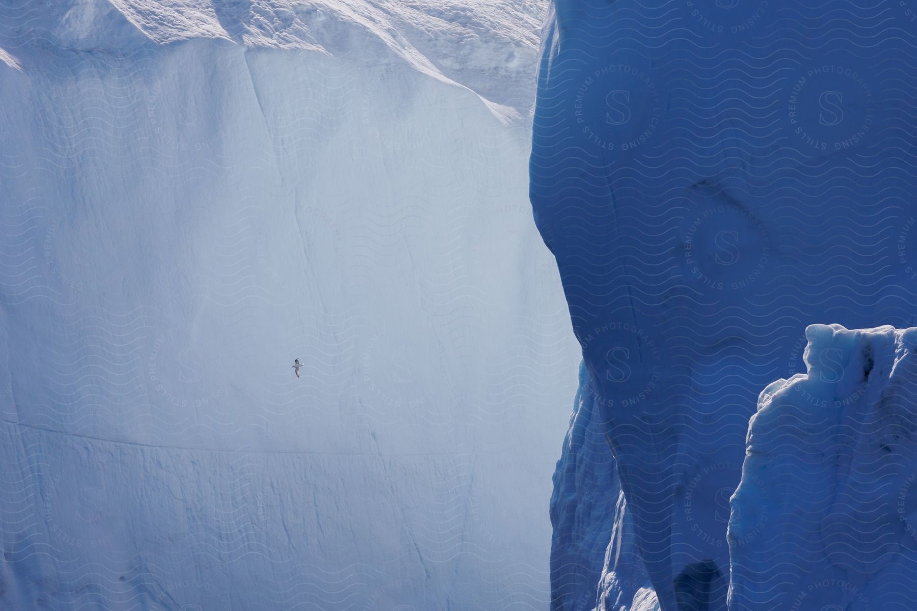 distant Person climbing a ice cap in the Arctic