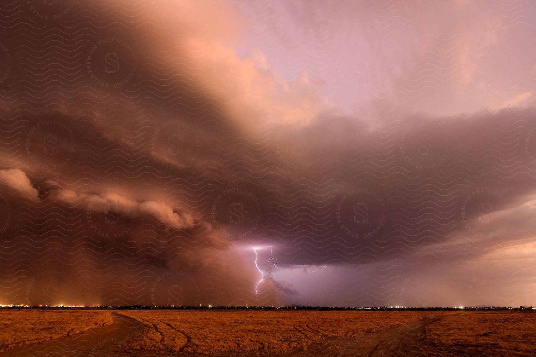 A storm of lightning and thunder is brewing on the horizon.