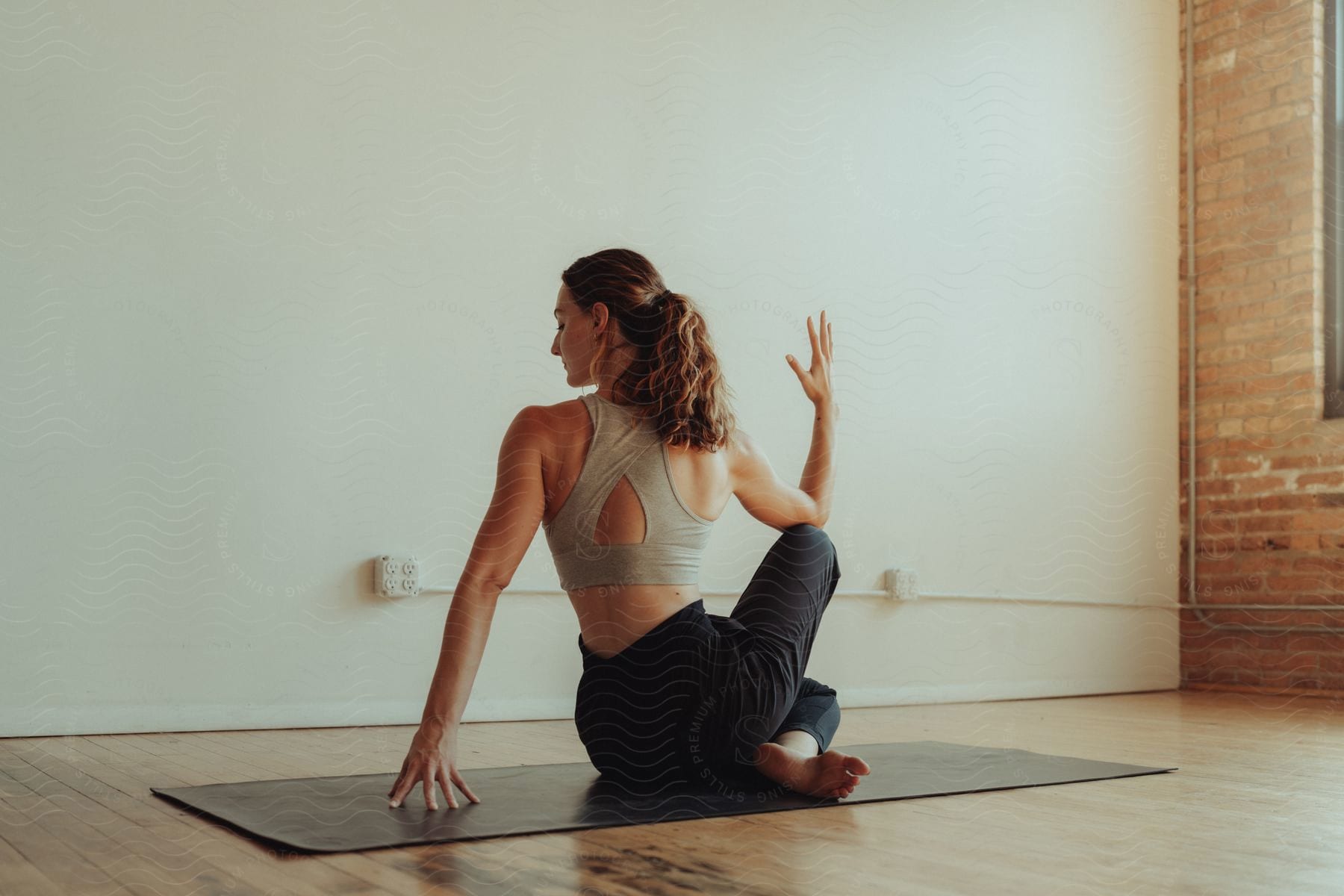 A relaxed woman practicing yoga.