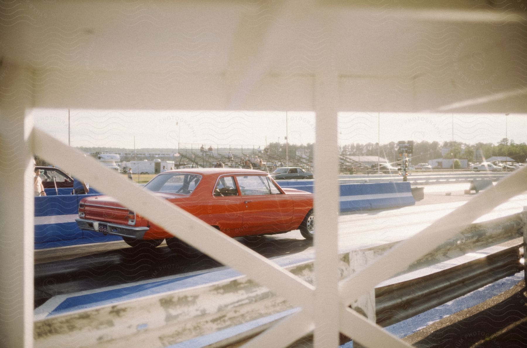 Vintage cars drive on a highway