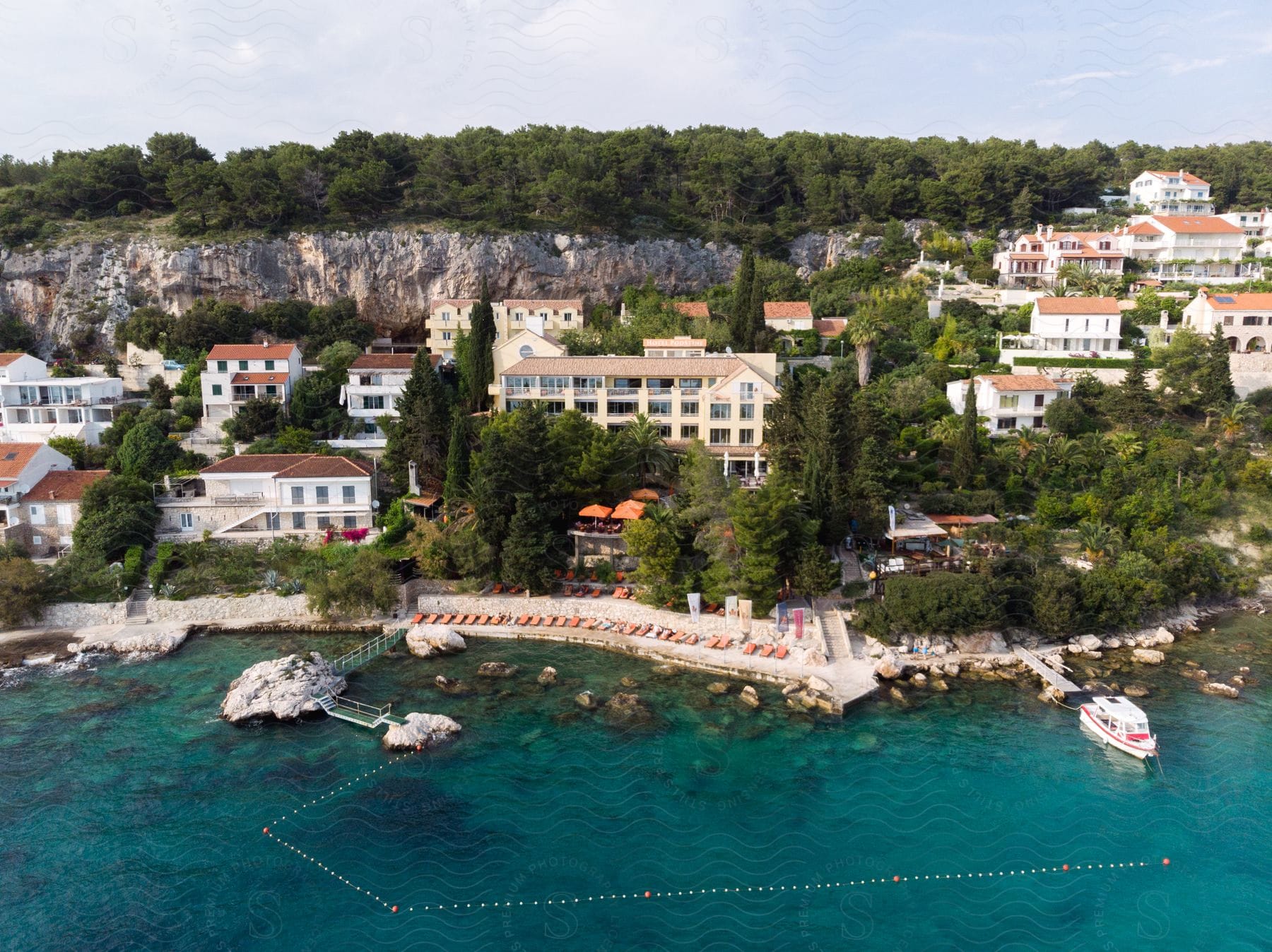 Beach chairs line the beach front of the Hotel Podstine in Hvar Croatia